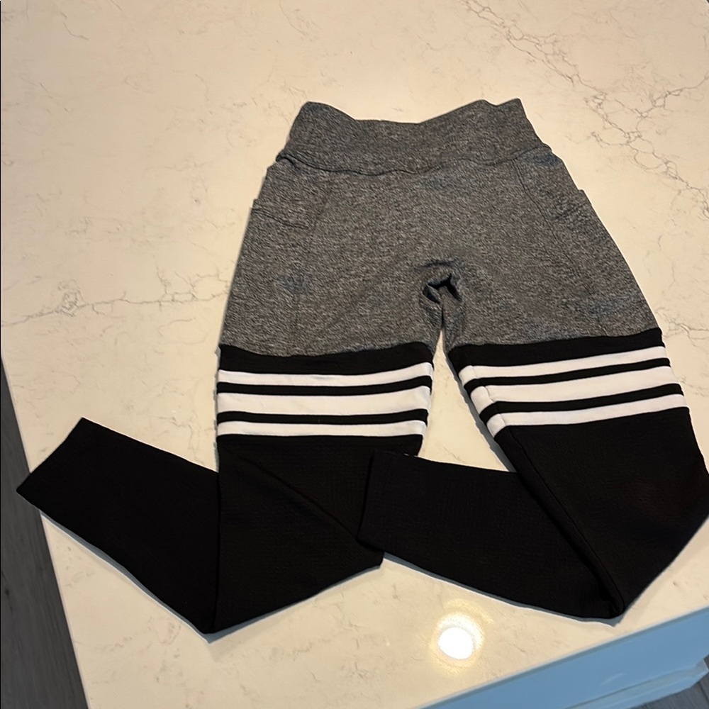 Bombshell Sportswear Gray and Black Striped Leggings